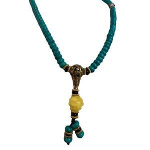 Vintage green beaded 16” Necklace Carved Yellow Jade or Jasper Pendant
